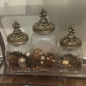 Set of Three Glass Jars with Ornate Gold Lids